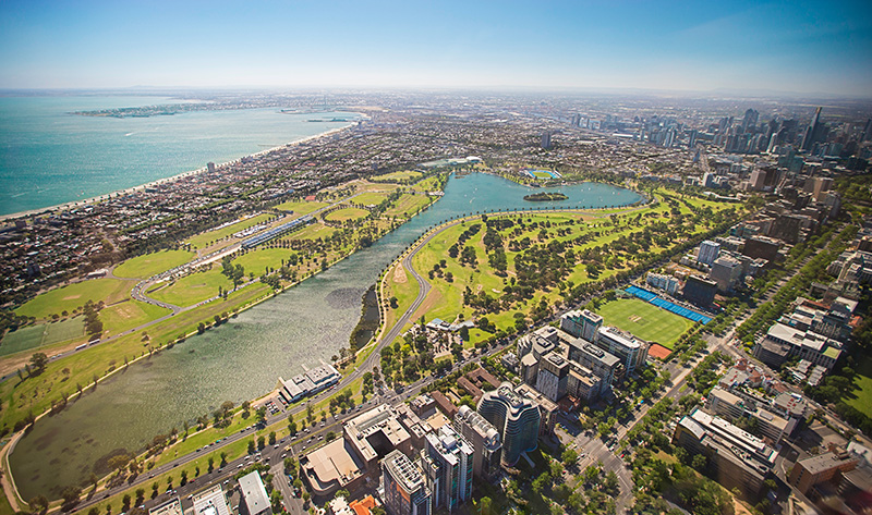 Aerial view of apartment buildings and parkland in Melbourne